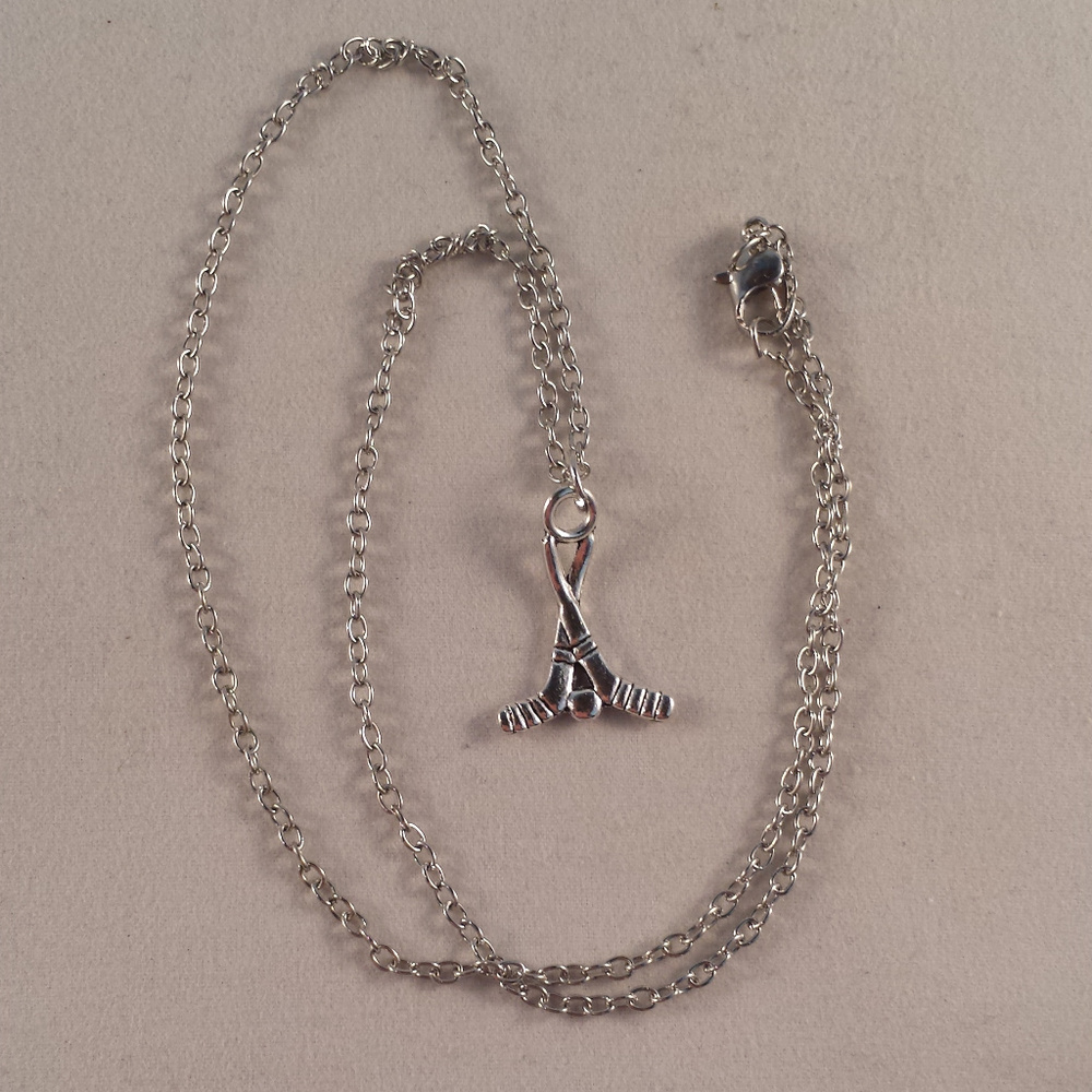 Silver Hockey Sticks Ball Pendant Necklace - Picture 2 of 2
